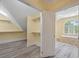 Bathroom with soaking tub, walk-in closet, and window at 205 Valley St, Walterboro, SC 29488