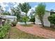 Brick pathway meanders to a charming pool area at 205 Valley St, Walterboro, SC 29488
