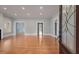 Hardwood floors and an open floor plan in this living room at 205 Valley St, Walterboro, SC 29488