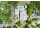 Overhead view of house, pool, and surrounding trees at 205 Valley St, Walterboro, SC 29488