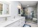 Spa-like bathroom with double vanity, large shower, and modern fixtures at 403 Pelican Flight Dr, Dewees Island, SC 29451