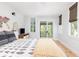 Bedroom with king bed, access to private porch at 403 Pelican Flight Dr, Dewees Island, SC 29451