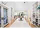 Open concept dining area with kitchen view at 403 Pelican Flight Dr, Dewees Island, SC 29451