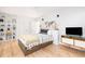 Bedroom with king-size bed, built-in shelving at 403 Pelican Flight Dr, Dewees Island, SC 29451