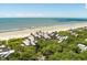 Aerial view of beachfront community with ocean and homes at 4426 Sea Forest Dr, Kiawah Island, SC 29455