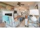 Open living space with fireplace and dining area at 4426 Sea Forest Dr, Kiawah Island, SC 29455