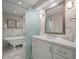 Bathroom with a clawfoot tub, marble tile, and modern vanity at 4426 Sea Forest Dr, Kiawah Island, SC 29455