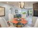 Elegant dining area with a view of the living room and ocean at 4426 Sea Forest Dr, Kiawah Island, SC 29455