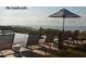 Relaxing poolside view with lounge chairs and ocean view at 4426 Sea Forest Dr, Kiawah Island, SC 29455