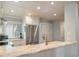 Kitchen with granite countertop, stainless steel appliances, and white cabinets at 4426 Sea Forest Dr, Kiawah Island, SC 29455