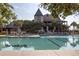 Community pool with clubhouse in the background at 4426 Sea Forest Dr, Kiawah Island, SC 29455