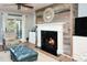 Cozy living room featuring a fireplace and ocean views at 4426 Sea Forest Dr, Kiawah Island, SC 29455