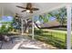 Covered patio with ceiling fans, offering a relaxing outdoor space at 100 Lilith Ln, Summerville, SC 29485