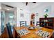Bright dining area with wood table and view of kitchen at 1721 Live Oak Park, Seabrook Island, SC 29455