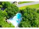 Community swimming pool surrounded by lush trees at 1721 Live Oak Park, Seabrook Island, SC 29455