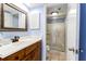 Clean bathroom with wood vanity and shower at 1721 Live Oak Park, Seabrook Island, SC 29455
