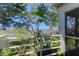 Screened porch with water views and wooden railing at 1721 Live Oak Park, Seabrook Island, SC 29455