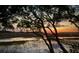 Stunning sunset over the marsh with a wooden pier at 1721 Live Oak Park, Seabrook Island, SC 29455