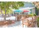 Casual outdoor dining area with colorful umbrellas at 1721 Live Oak Park, Seabrook Island, SC 29455