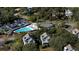 Community pool and surrounding houses from above at 2221 Oyster Catcher Ct, Seabrook Island, SC 29455