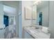 Bathroom with marble vanity and view into bedroom at 2221 Oyster Catcher Ct, Seabrook Island, SC 29455
