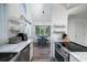 Eat-in kitchen with stainless steel appliances and breakfast bar at 2221 Oyster Catcher Ct, Seabrook Island, SC 29455