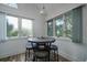 Small dining area with four-person table and window views at 2221 Oyster Catcher Ct, Seabrook Island, SC 29455