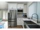 Updated kitchen with stainless steel sink and modern appliances at 2221 Oyster Catcher Ct, Seabrook Island, SC 29455