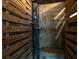 Rustic outdoor shower with wooden walls and bench at 2221 Oyster Catcher Ct, Seabrook Island, SC 29455
