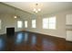 Spacious living room featuring hardwood floors and a fireplace at 489 Eagleview Dr, Moncks Corner, SC 29461