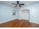 Hardwood floor bedroom with spacious closet and ceiling fan at 480 Magnolia Rd, Charleston, SC 29407