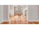 Elegant entryway with hardwood floors, chandelier, and staircase at 143 Island Park Dr, Charleston, SC 29492