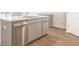 Kitchen island with stainless steel dishwasher and gray cabinets at 3101 Dalmore Dr, Ravenel, SC 29470