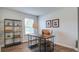 Home office with built-in shelving and a comfortable workspace at 3093 Dalmore Dr, Ravenel,  29470