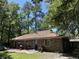 Brick house exterior with a large backyard and trees at 106 Teddy Ct, Summerville, SC 29485