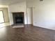 Living room with fireplace and wood-look flooring at 106 Teddy Ct, Summerville, SC 29485