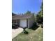 Brick home with attached garage and well-maintained lawn at 4504 Winterwood Pl, Ladson, SC 29456