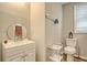 Small bathroom with white vanity, toilet, and shower at 2832 Ranger Dr, North Charleston, SC 29405
