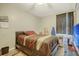 Bedroom with double bed, TV, and dark-colored bedding at 2832 Ranger Dr, North Charleston, SC 29405