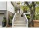 Inviting entryway with stairs, landscaping, and attached garage at 191 Harbour Watch Way, Mount Pleasant, SC 29464