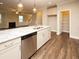 Island kitchen with granite countertops and stainless steel dishwasher at 508 Eagleview Dr, Moncks Corner, SC 29461