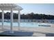 Community pool with a pergola and lake view at 508 Eagleview Dr, Moncks Corner, SC 29461