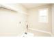 Simple laundry room with shelving and window at 508 Eagleview Dr, Moncks Corner, SC 29461