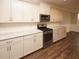 Modern kitchen with white cabinets and granite countertops at 508 Eagleview Dr, Moncks Corner, SC 29461
