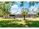Relaxing pool area with screened enclosure at 1426 Sc-45, McClellanville, SC 29458