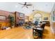 Spacious living room with hardwood floors, fireplace and multiple seating areas at 1426 Sc-45, McClellanville, SC 29458