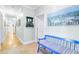 Inviting hallway with light walls and a blue bench at 1426 Sc-45, McClellanville, SC 29458