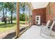 Relaxing screened porch overlooking the backyard at 1426 Sc-45, McClellanville, SC 29458