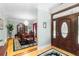 Formal dining room with hardwood floors, chandelier, and large table at 1426 Sc-45, McClellanville, SC 29458