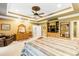 Main bedroom with carpeted floors, built-in entertainment center and sitting area at 1426 Sc-45, McClellanville, SC 29458